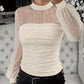 Transparante top met faux parels en lantaarnmouwen
