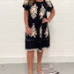 👗 Vintage jurk met ronde hals en katoenprint