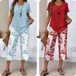 Casual set bestaande uit een tuniek met ronde hals en laagjes en een broek met wijde pijpen
