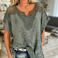 Elegante damesblouse met V-hals en kantborduurwerk