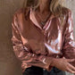 Dameshemd met glanzend metallic lederen knoopsluiting