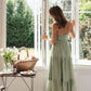 Elegante damesjurk met spaghettibandjes en sexy diepe V-hals