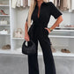 Dames-jumpsuit met knoopsluiting en strikceintuur in de taille