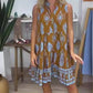 Casual Vrouwenjurk met V-Hals en Mouwloze Print