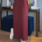 Mouwloze maxi-jurk met V-hals en split voor dames