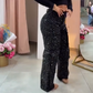 Dames broek met strass-steentjes en wijde pijpen met zakken