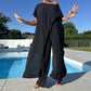 Set van eenkleurige off-the-shoulder top en broek