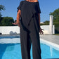Set van eenkleurige off-the-shoulder top en broek