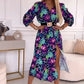 Elegante damesjurk met bloemendruk, v-neck en zijspleet