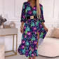 Elegante damesjurk met bloemendruk, v-neck en zijspleet