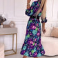Elegante damesjurk met bloemendruk, v-neck en zijspleet