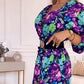 Elegante damesjurk met bloemendruk, v-neck en zijspleet