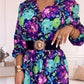 Elegante damesjurk met bloemendruk, v-neck en zijspleet