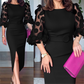 Elegante jurk met getailleerde snit en pofmouwen van mesh