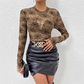 Doorschijnende damesblouse met lange mouwen