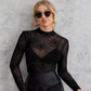 Doorschijnende damesblouse met lange mouwen