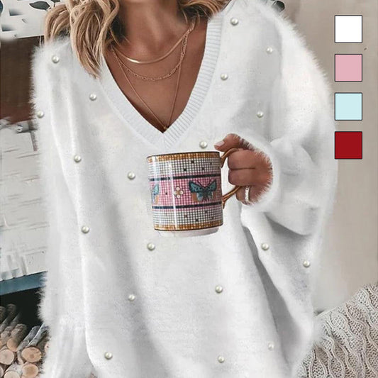 V-hals oversized trui met lange mouwen, kralenversiering en pluizige bovenkant