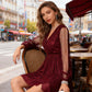 Elegante feestjurk met V-hals, pailletten en mesh mouwen