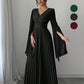 Elegante maxi-jurk met V-hals, plooien en vloeiende mouwen