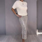 Dames tweedelige set: gebreid topje en paillettenrok