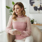 Transparante top met faux parels en lantaarnmouwen