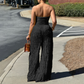 Strapless jumpsuit met wijde pijpen en kreukels