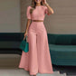 Set bestaande uit een elegante crop top met pofmouwen en een broek met wijde pijpen