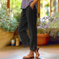 Casual effen cropped broek met losse pasvorm en knopen aan de zijkant