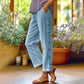 Casual effen cropped broek met losse pasvorm en knopen aan de zijkant