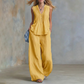 Elegante set met een losvallende mouwloze top en broek
