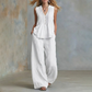 Elegante set met een losvallende mouwloze top en broek