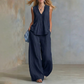 Elegante set met een losvallende mouwloze top en broek
