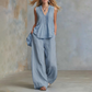 Elegante set met een losvallende mouwloze top en broek