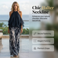 Tweedelige, soepelvallende haltertop-outfit voor dames met een broek met print