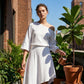 Set bestaande uit een off-shoulder top en een asymmetrische rok voor dames