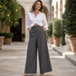Dames hoog getailleerde wijde pijpen broek met contrasterende bies