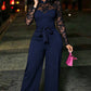 Elegante jumpsuit voor dames met kantmozaïek en riem