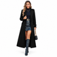 Lange damesjas met dubbele knoopsluiting en structuur – elegante bovenkleding voor onderweg